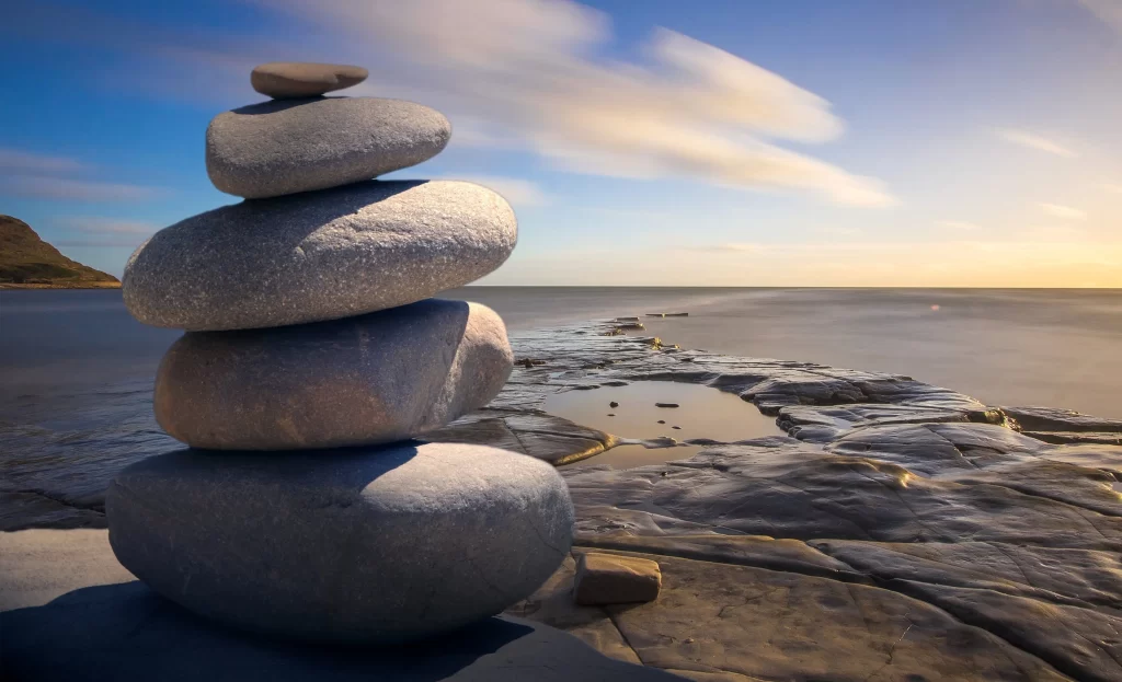 Beautiful view of sea from shore and some rocks balanced